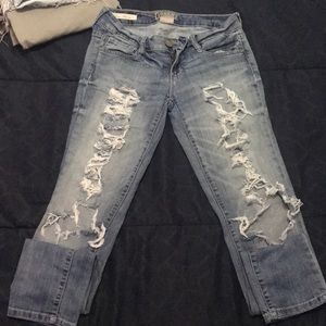 Extremely destroyed skinny jeans